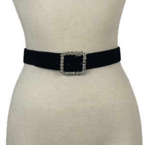 Black velvet belt with a rhinestone buckle on a mannequin.
