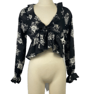 Black floral cropped blouse with ruffled sleeves and tie front.